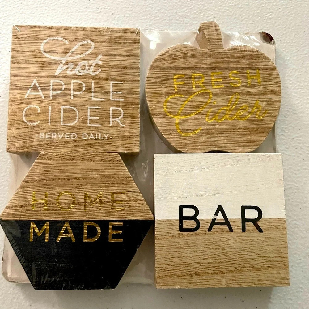NWT 4pc wood decor prop pack with various sayings & shapes. Black, white & gold.
